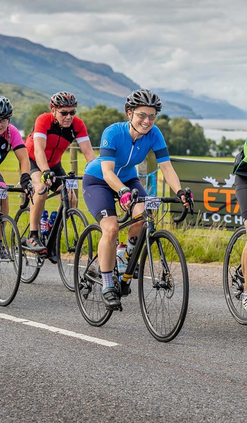 Participants riding along side Loch Ness