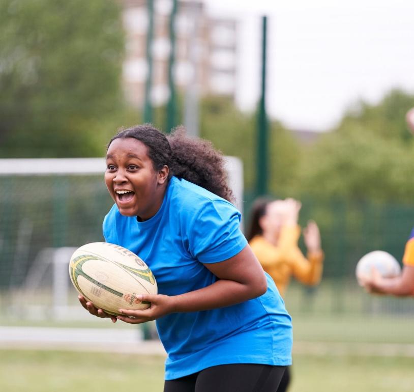 Go! London participant playing rugby